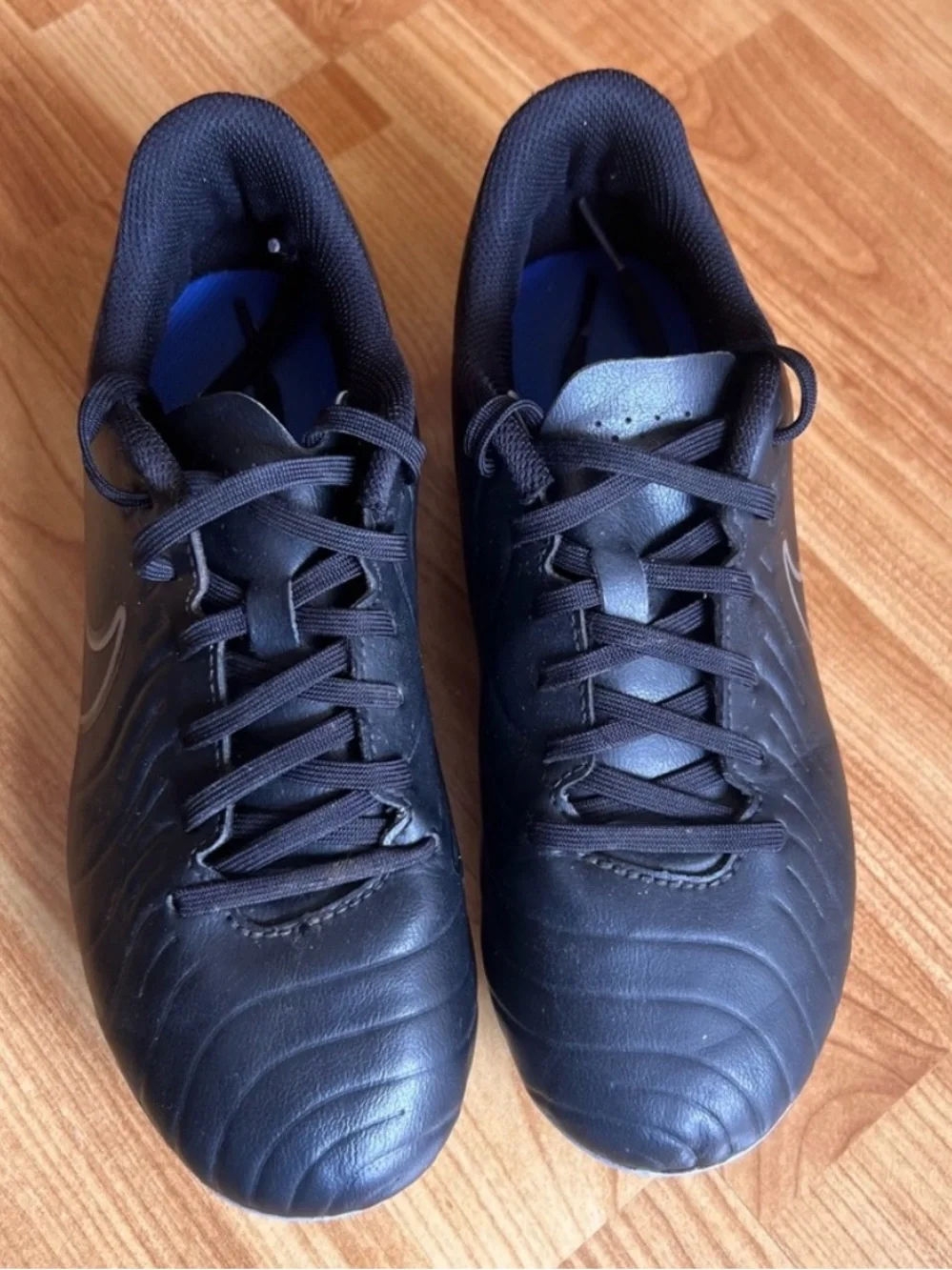 Nike Boy’s Black Soccer Cleats with Blue Accents